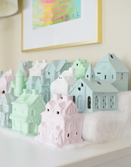 miniature Christmas village set in pastel colors