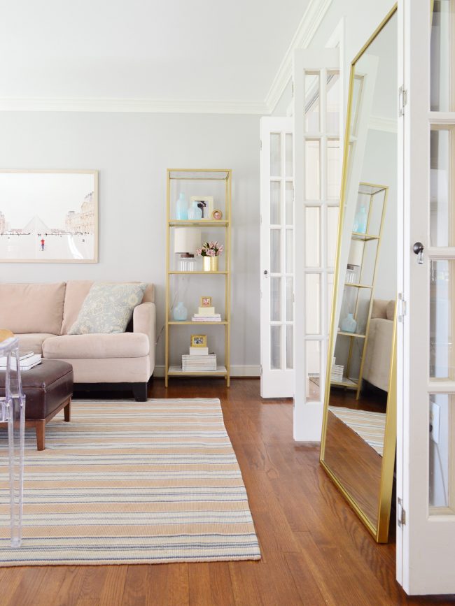 neutral living room with gold accents