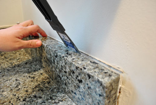 Removing Tile Backsplash Removing The Side Splash Backsplash From Our Bathroom Sink Young Removing Tile Backsplash Removing The Side Splash Backsplash From Our Bathroom Sink Young