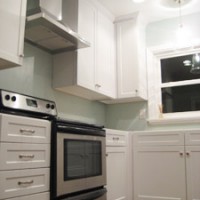 A Stainless Steel Hood In The Kitchen