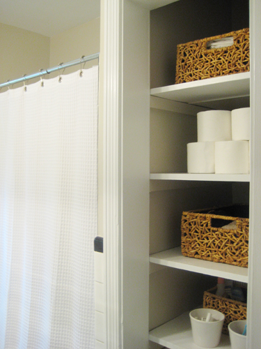Take The Door Off Your Bathroom Linen Closet For A Chic And Open Feeling - How To Make A Bathroom Linen Cupboards