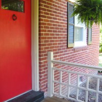 Hanging Ferns On The Front Porch