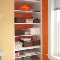Taking The Doors Off A Bathroom Linen Storage For Open Shelving