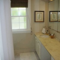 A Bathroom Makeover With Vinyl Tile & Fresh Accessories