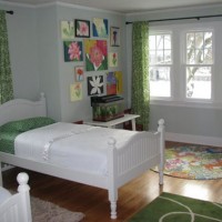 A Cheerful Kids Room With Two Twin Beds