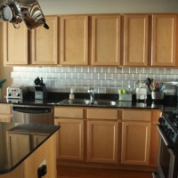 How To DIY A $100 Backsplash With Stainless Steel Stick-On Wall Tile