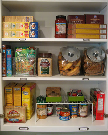 Snack cabinet all set up, with the toddler's snacks within their reach  (bottom shelf not pictured is surplus) : r/organization