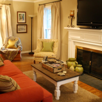 A Living Room Full Of Built-Ins And Windows