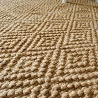 A Large Jute Rug For The Bedroom