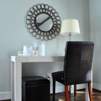 A Round Mirror Over Our Desk