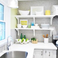 A Kitchen Makeover With Penny Tile And Open Shelves