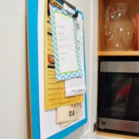 Hanging A Clipboard In A Cabinet To Organize Takeout Menus