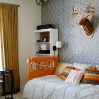 An Amazing Big Boy Room With Patterned Wallpaper