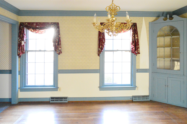 Before Photo Of Dining Room With Blue Trim And Dated Wallpaper