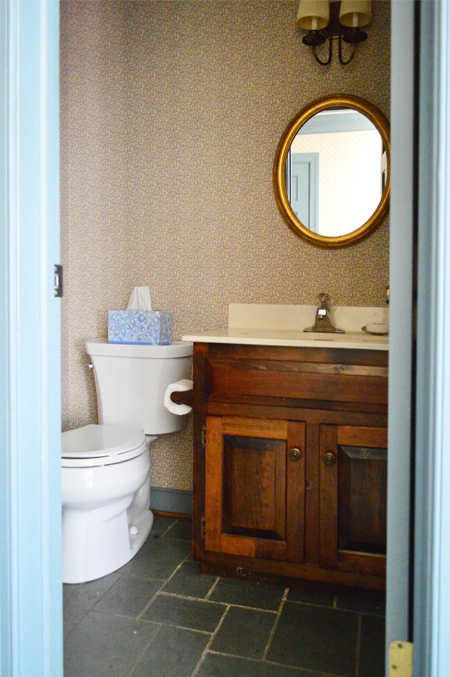Before Photo Of Half Bathroom With Old Wallpaper And Small Mirror