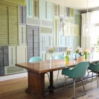 Dining Room With Accent Wall Of Colorful Shutters