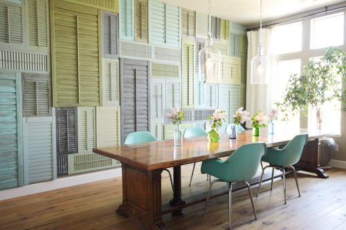 Dining Room With Accent Wall Of Colorful Shutters