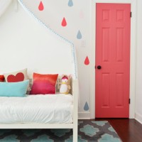 Girls Bedroom With Daybed And Pink Door With Raindrop Mural