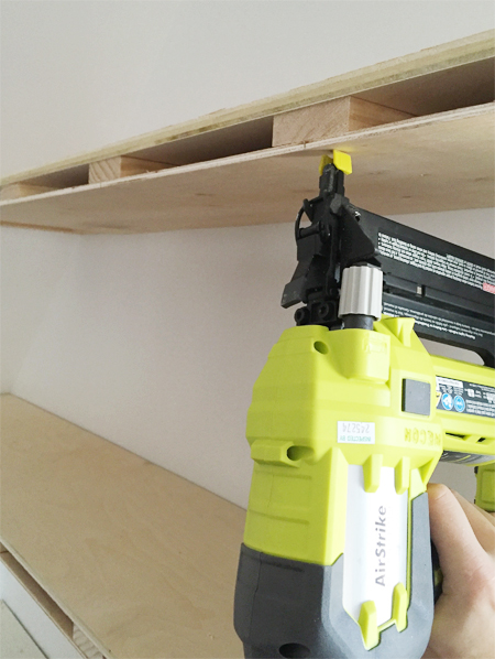 A Ryobi power nailer to attach thin plywood sheet to bottom of do it yourself floating shelves
