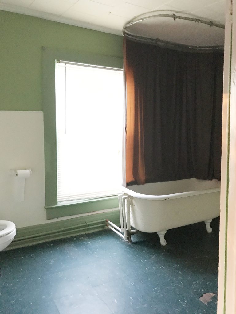 Before Photo Of Bathroom With Clawfoot Tub And Show Curtain