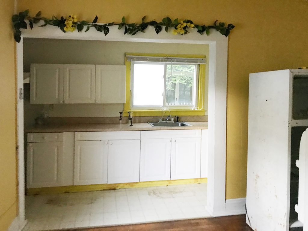 Before Photo Of Yellow And White Galley Style Kitchen