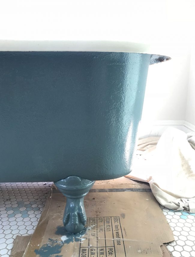 Navy blue painted refinished clawfoot tub