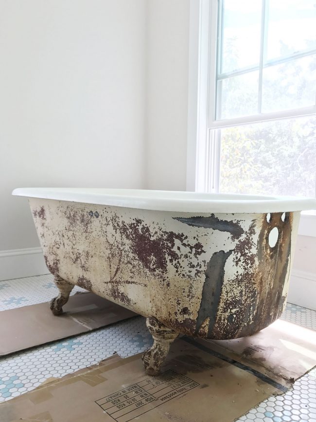 Rust removed from the outside of an old clawfoot tub