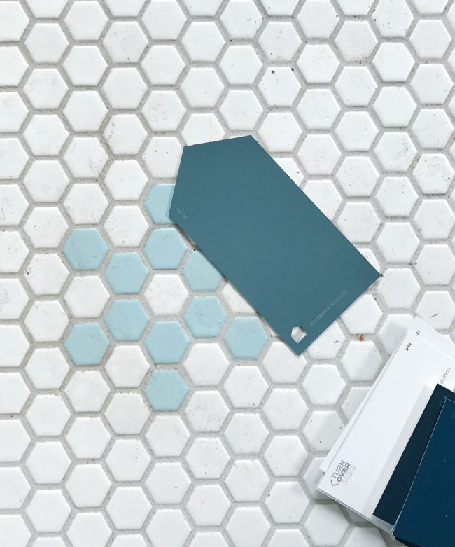 Paint swatch on blue tile hex floor