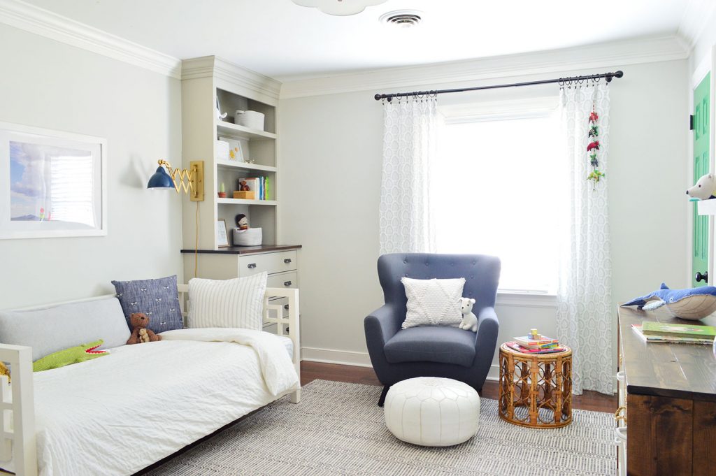 Boys Bedroom With Custom Bookshelves And Reading Chair