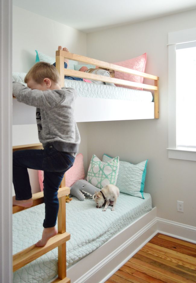 diy built in wall to wall bunk beds with child climbing ladder