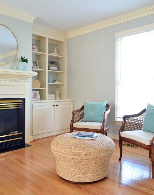 seating area in master bedroom simplified for staging purposes