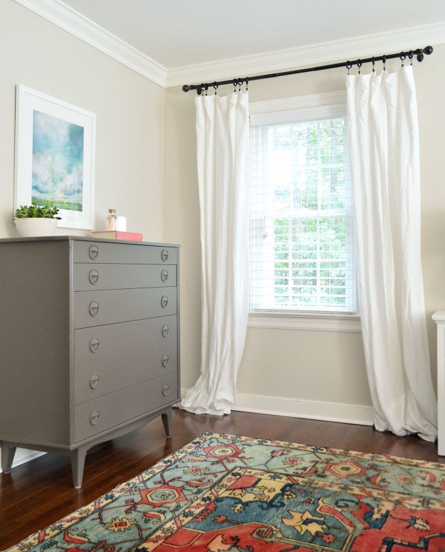 messy unironed curtains in master bedroom