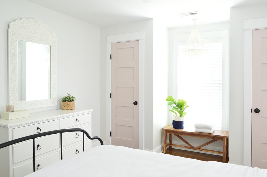 Traditional Beachy Bedroom With Pink White Truffle Closet Doors Flanking Window Bench