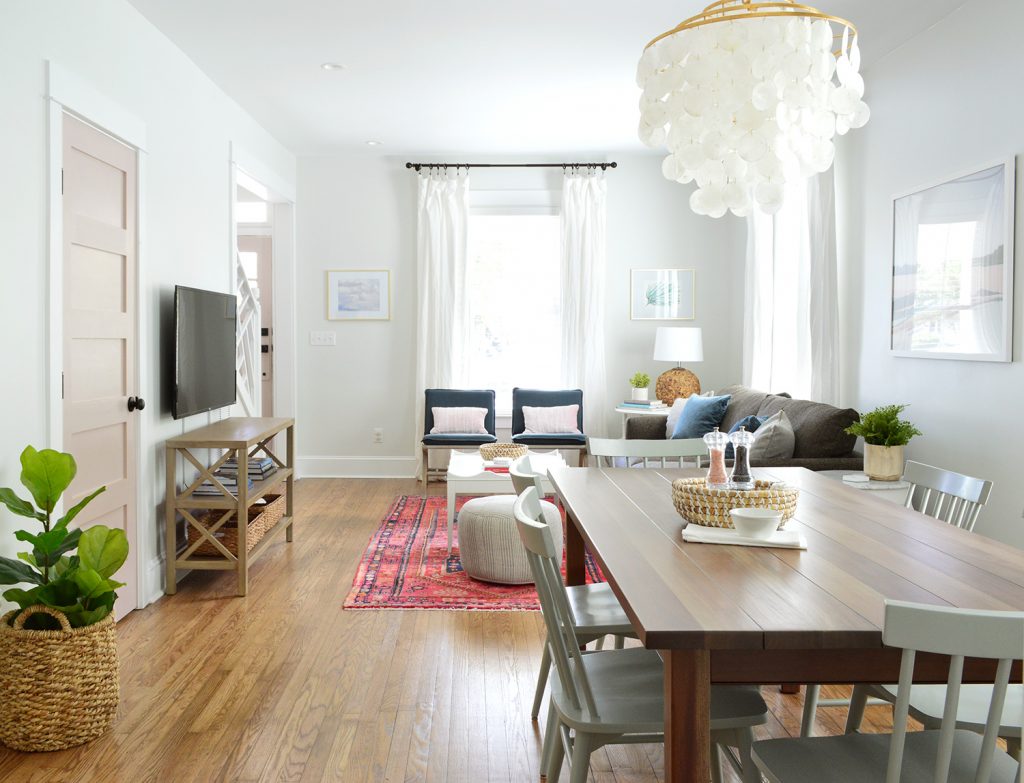 View From Duplex Kitchen With Dining Table And Capiz Chandelier