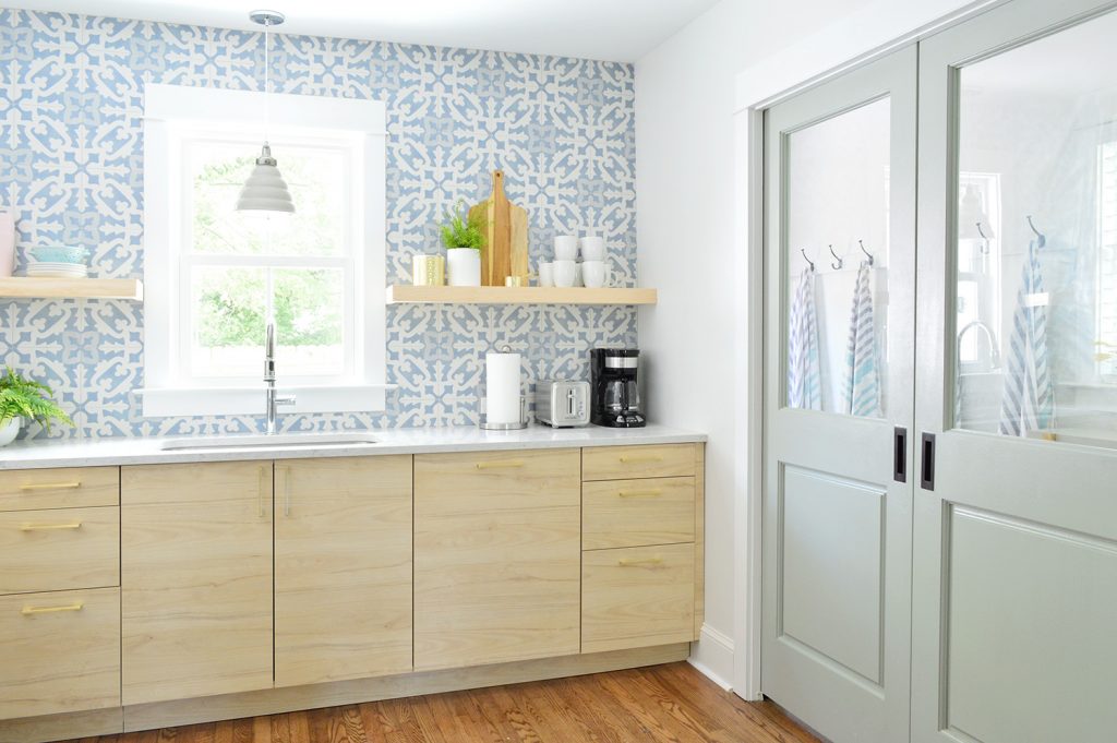 Blue Pocket Doors In Duplex Kitchen Between Mudroom