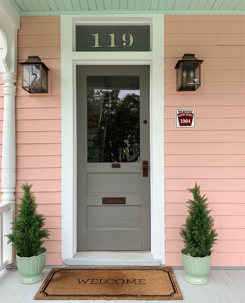 Pink Beach House Historic Front Door With Pure White Trim