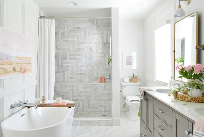 After Photo Of Modern Marble Bathroom With Walk-In Shower And Freestanding Tub And Herringbone Tile Pattern