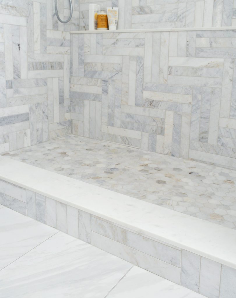 Marble Herringbone Modern Pattern In Walk In Shower With Hex Tile Floor