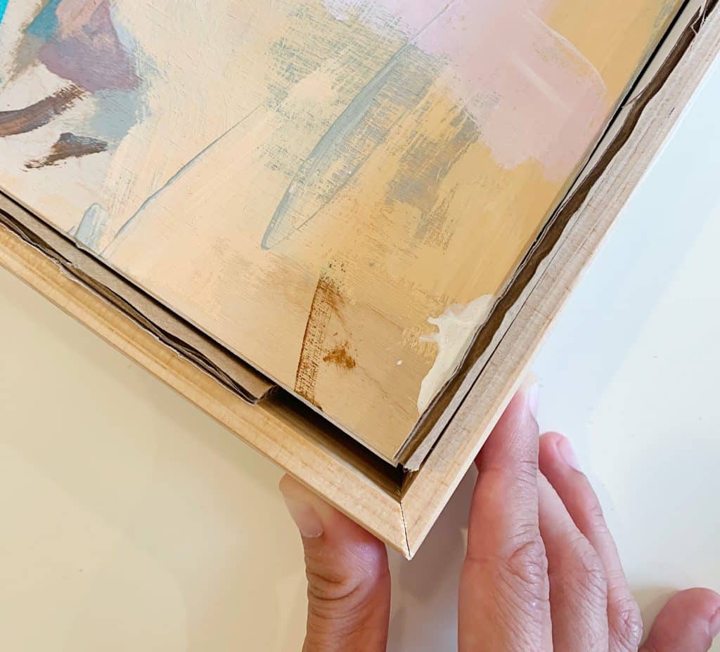 DIY Float Frame Around Artwork Spaced With Cardboard