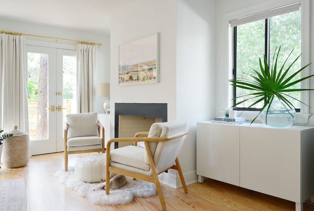 White Ikea Besta Cabinet Under Window In Bedroom Behind Chair