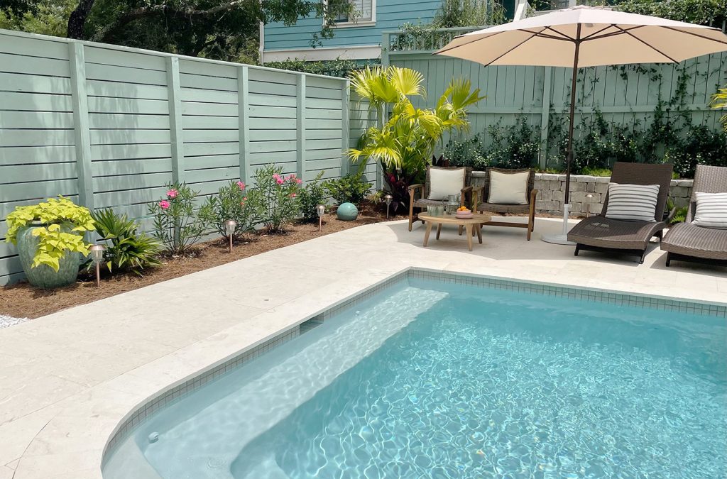 Small Backyard Pool With Fence Along One Side