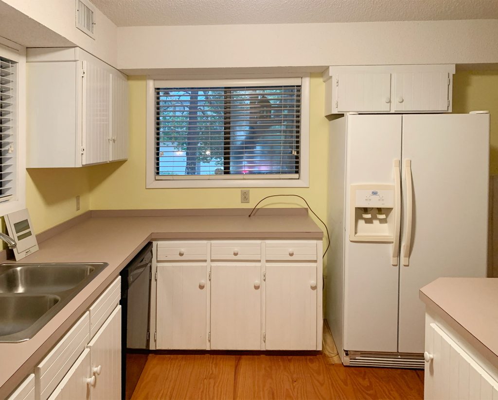 Kitchen Before Photo With Pink Counters And Yellow Walls