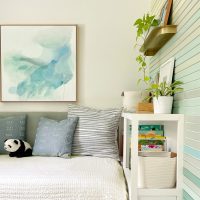 A Small Kids Bedroom With Lots Of Functional Storage That’s Built Right In