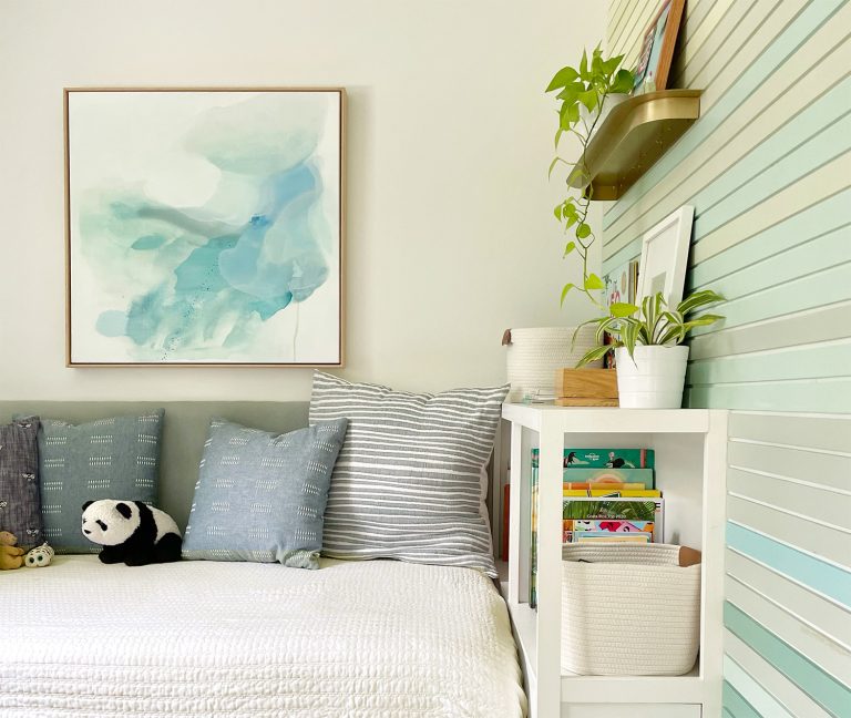 Small Kids Bedroom With Upholstered Headboard And Bookcase With Colorful Accent Wall