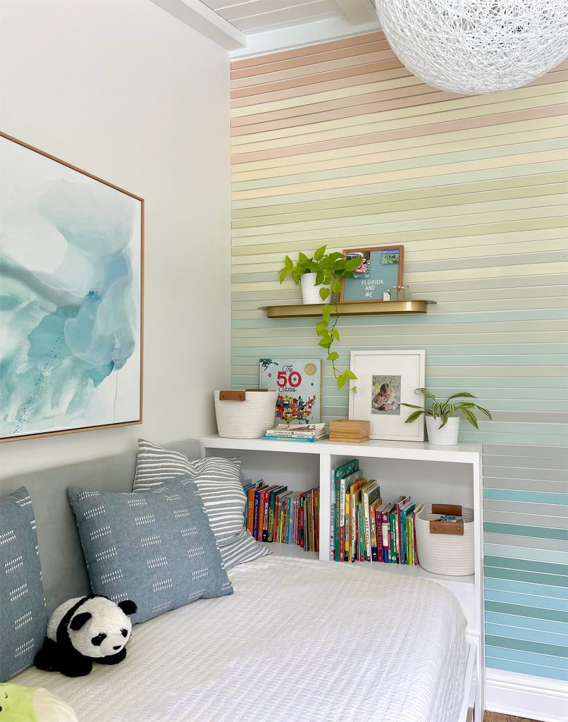 Small Kids Bedroom With Built In Bookcase And Colorful Wood Wall