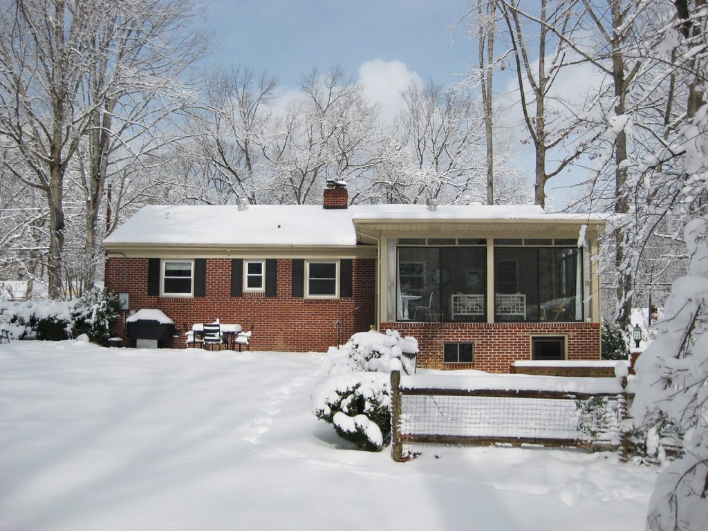 Brick Ranch Covered In Snow