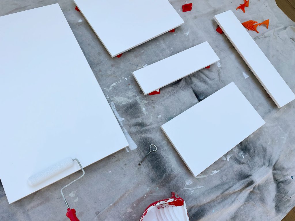 Applying Primer To Ikea Kitchen Cabinet Doors With Foam Roller