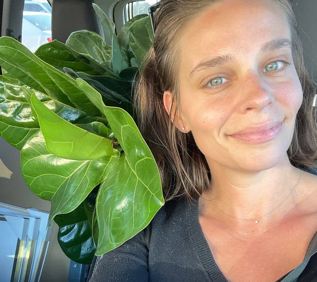 Sherry in car with plant in Florida