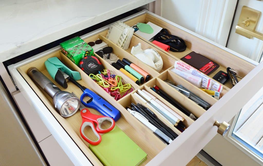 Close Up Of Junk Drawer With Wood Dividers In Ikea Kitchen
