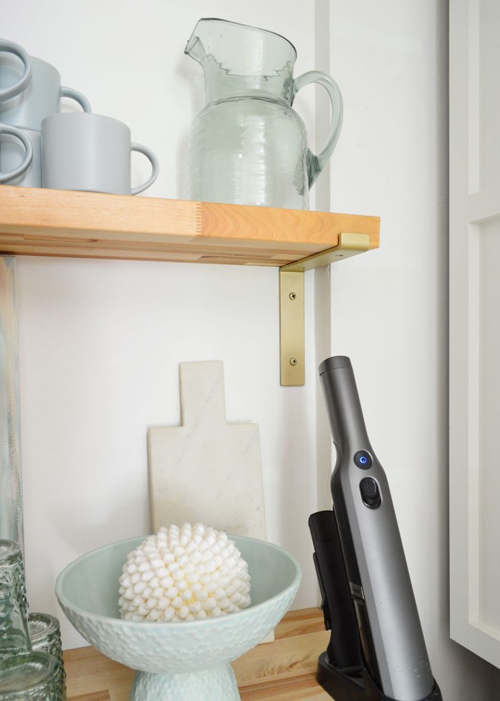 Detail Of Brass Floating Shelf Bracket With Butcher Block Shelf